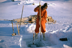 Cutting-holes-in-lake-ice_1960s_Bailey-2-scaled